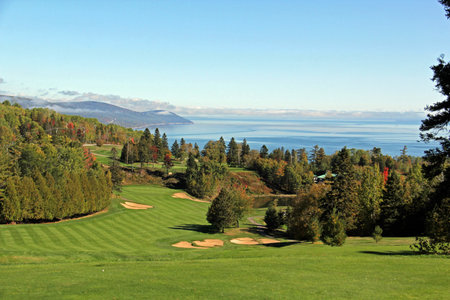 Scenic golf holes in the fall season with panoramic viewの写真素材