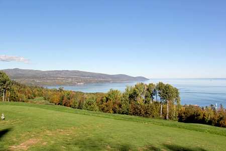Scenic golf holes in the fall season with panoramic viewの写真素材