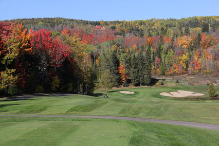 Scenic golf holes in the fall season with panoramic viewの写真素材