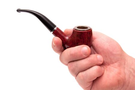 The man's hand holds tube for smokingの写真素材