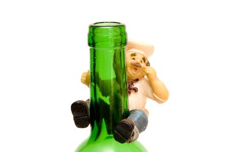 The original figurine sits on bottle neckの写真素材