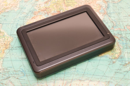 The modern autonavigator lies on world map