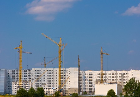Building of the new high house by the craneの写真素材