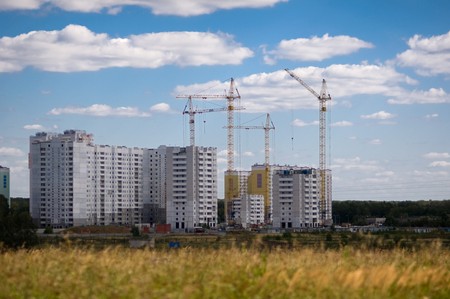Building of the new high house by the craneの写真素材