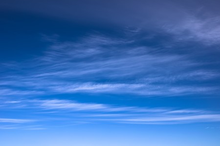 White clouds against the blue skyの写真素材