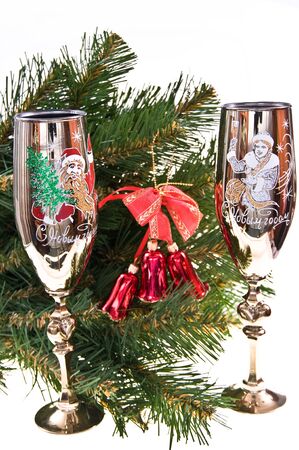 Two New Year's glasses near to a fur-treeの写真素材