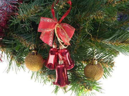 Hand bells on a Christmas New Year treeの写真素材