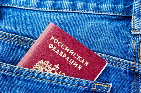 Russian passport in his pocket jeansの写真素材