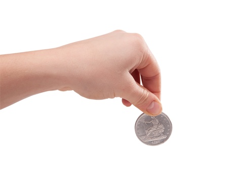 female hand holding a silver dollar coinの写真素材