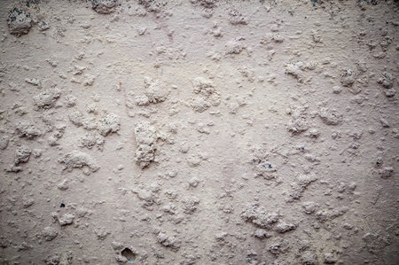 brown wall with cracked plaster timeの写真素材