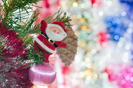 Santa Claus with gifts under a fur-treeの写真素材