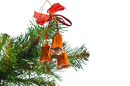 Hand bells on a Christmas New Year treeの写真素材