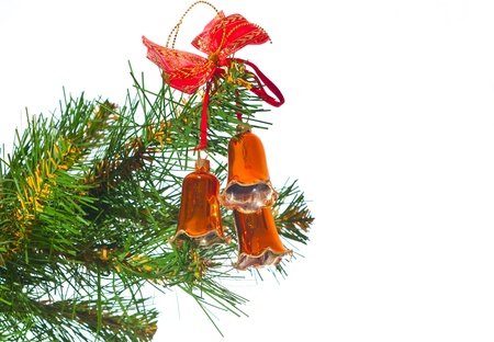 Hand bells on a Christmas New Year treeの写真素材