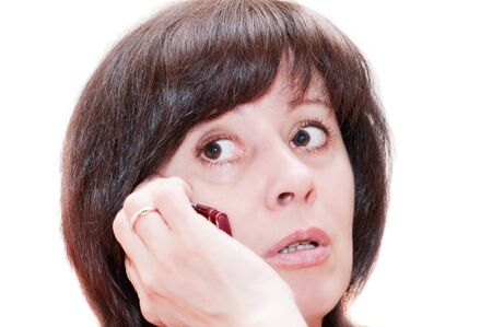 a woman talking on the phoneの写真素材