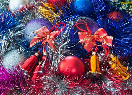 Hand bells on a Christmas New Year treeの写真素材