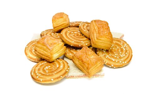 a bunch of different cookies and crackersの写真素材