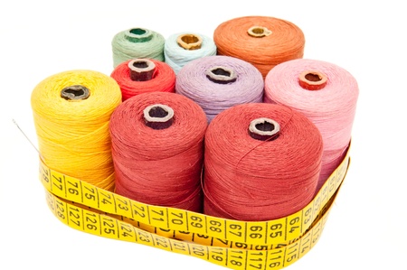 yarns of different colors wound on the coilの写真素材