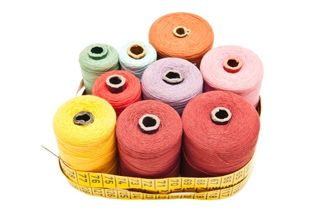yarns of different colors wound on the coilの写真素材