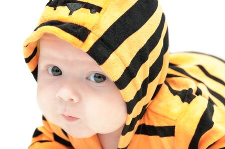 Newborn baby lying in a blanketの写真素材