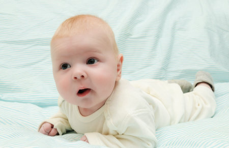 Newborn baby lying in a blanket