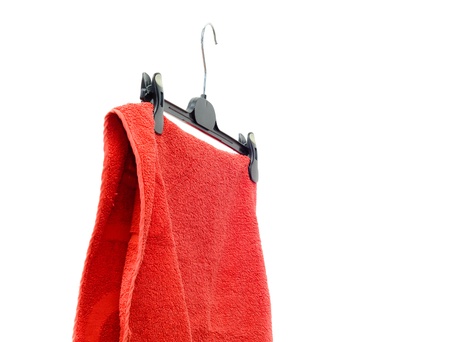 red towel for a shower on a hangerの写真素材