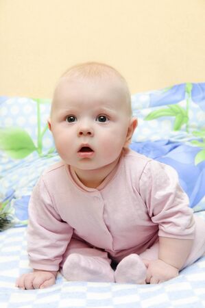 a small child looking surprisedの写真素材