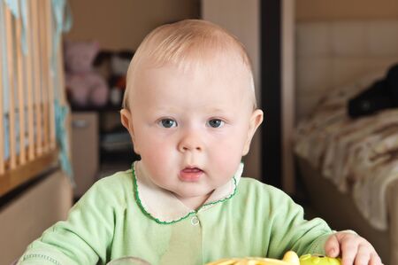 a small child looking surprisedの写真素材