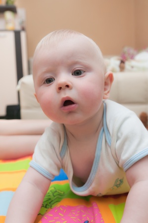 a small child looking surprisedの写真素材