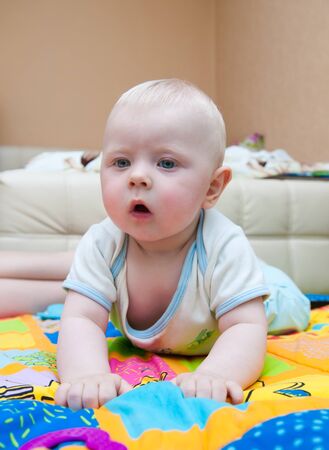 a small child looking surprisedの写真素材