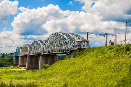 The railway bridge over the riverの写真素材