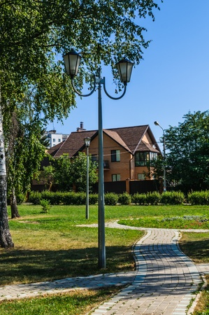 footpath to the house leads through the parkのeditorial素材