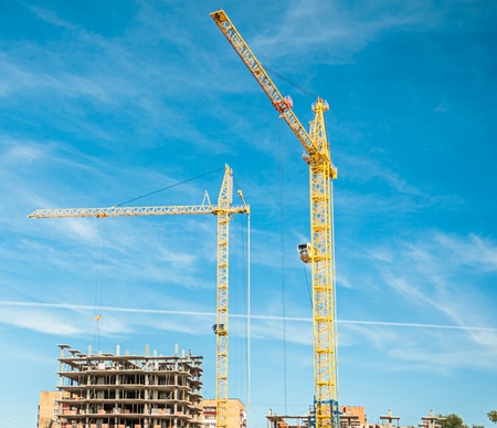 Building of the new high house by the craneの写真素材