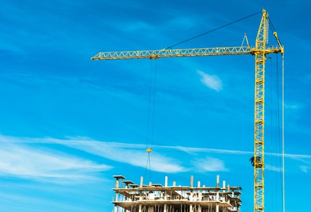 Building of the new high house by the craneの写真素材