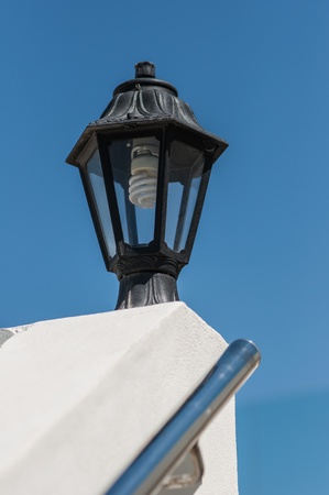 street lamp on the wall against the blue skyの写真素材