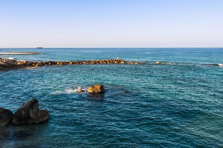 beautiful sea landscape of the island of Cyprus with a rocky shoreの写真素材