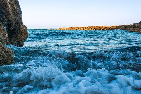 beautiful sea landscape of the island of Cyprus with a rocky shoreの写真素材