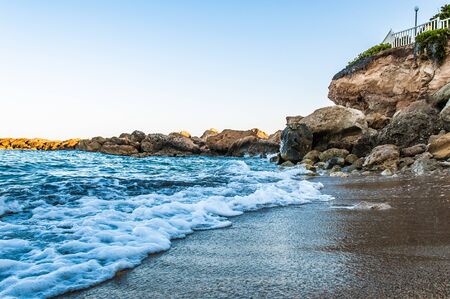 beautiful sea landscape of the island of Cyprus with a rocky shoreの写真素材