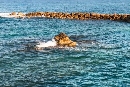 beautiful sea landscape of the island of Cyprus with a rocky shoreの写真素材