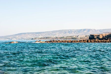 beautiful sea landscape of the island of Cyprus with a rocky shoreの写真素材