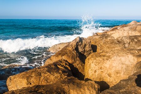 beautiful sea landscape of the island of Cyprus with a rocky shoreの写真素材