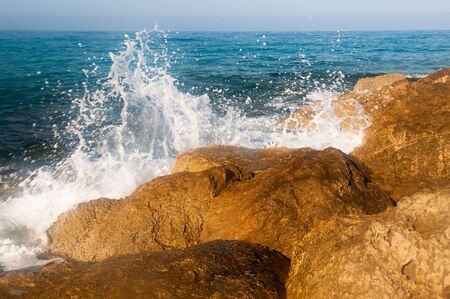 beautiful sea landscape of the island of Cyprus with a rocky shoreの写真素材