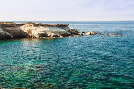 beautiful sea landscape of the island of Cyprus with a rocky shoreの写真素材