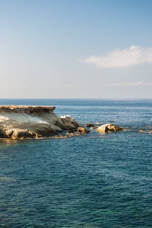 beautiful sea landscape of the island of Cyprus with a rocky shoreの写真素材