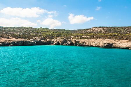 beautiful sea landscape of the island of Cyprus with a rocky shoreの写真素材