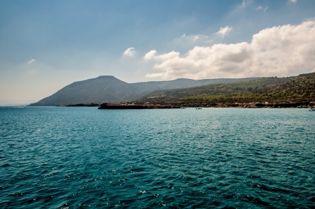 beautiful sea landscape of the island of Cyprus with a rocky shoreの写真素材