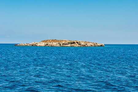 beautiful sea landscape of the island of Cyprus with a rocky shoreの写真素材