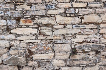 wall of the ancient buildings of stone stone backgroundの写真素材