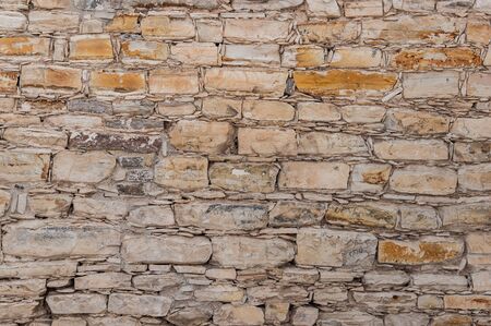 wall of the ancient buildings of stone stone backgroundの写真素材