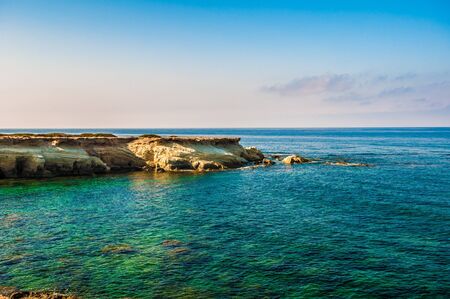 beautiful sea landscape of the island of Cyprus with a rocky shoreの写真素材