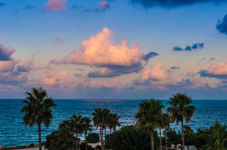 waves on the sea landscape on a background of blue sky with cloudsの写真素材